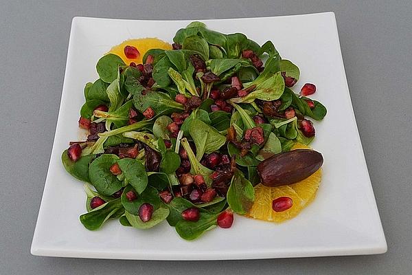 Lamb`s Lettuce with Pomegranate Seeds, Bacon and Dates