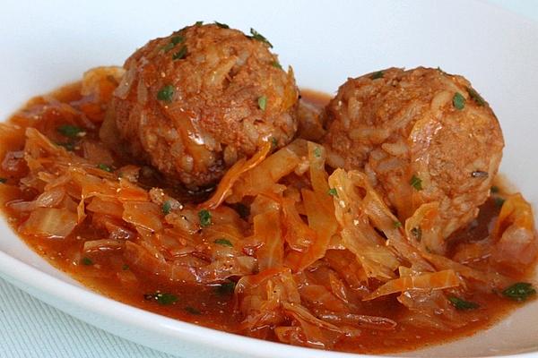 Minced Meat Dumplings on White Cabbage