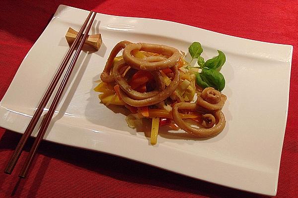 Octopus Marinated in Teriyaki on Top Of European Wok Vegetables