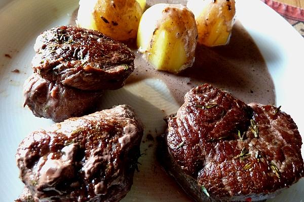 Ostrich Steaks Out Of Oven