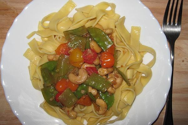 Pasta with Mixture Of Tomatoes, Snow Peas and Cashew Nuts