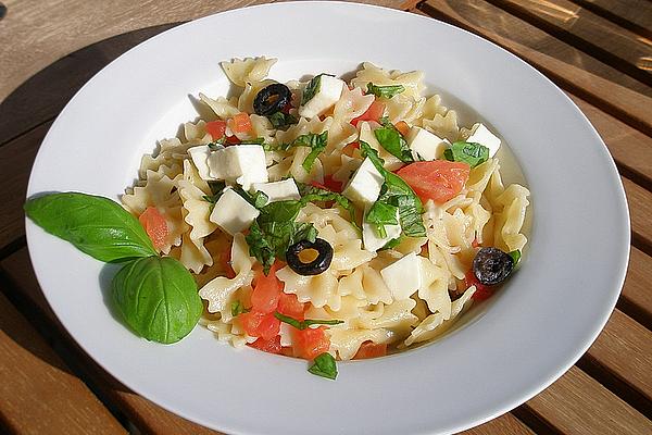 Pasta with Tomatoes, Sheep Cheese and Olives