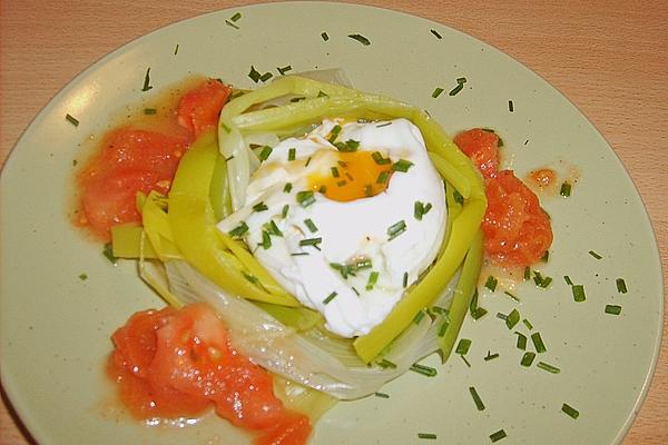 Poached Eggs in Leek Nest with Tomato Vinaigrette
