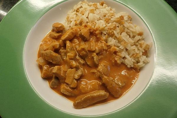 Pork Strips with Rice and Cream Sauce
