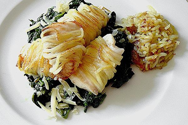 Potato-coated Tilapia on Spinach Leaves