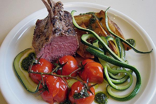 Rack Of Lamb with Braised Tomatoes and Zucchini Strips