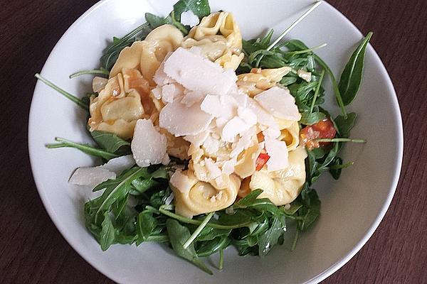 Ricotta Tortellini with Rocket, Tomatoes and Pine Nuts