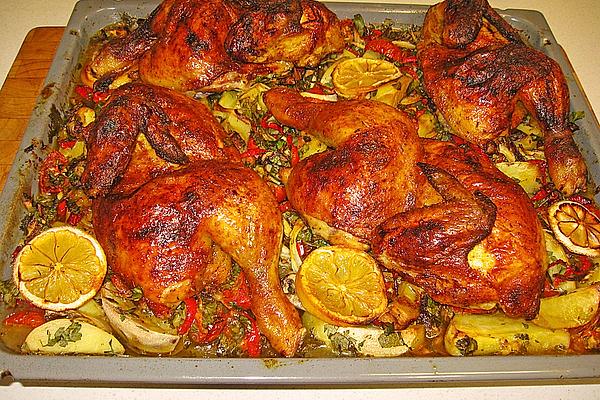 Roast Chicken from Tray with Lemon and Potatoes
