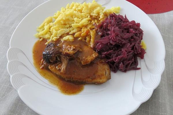 Roast Pork Rübenberger Style with Knöpfle and Apple Red Cabbage