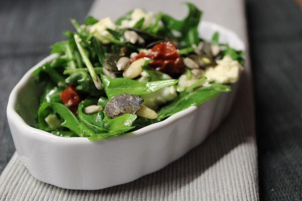 Rocket Salad with Sun-dried Tomatoes, Feta Cheese and Pine Nuts