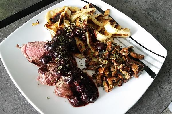 Saddle Of Venison with Chanterelles and Blueberries