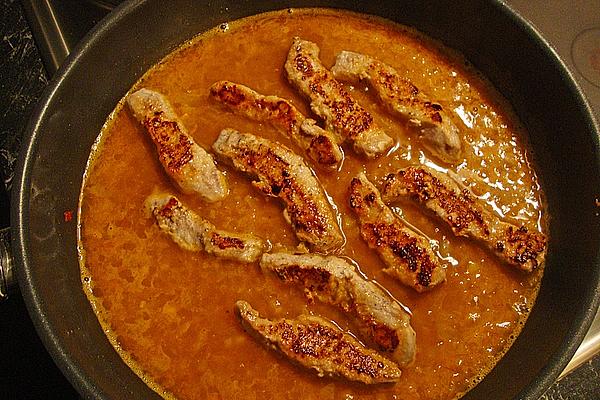 Schnitzel Strips in Onion and White Wine Sauce