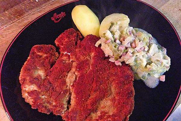 Schnitzel with Onion and Apple Mixture with Pointed Cabbage