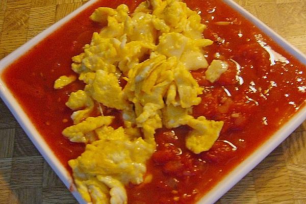 Scrambled Eggs with Cheese on Tomato Sauce