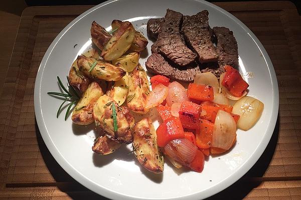 Sliced ​​hip Steaks with Rosemary Potatoes