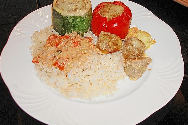 Stuffed Peppers and Zucchini, Gratinated with Cheese