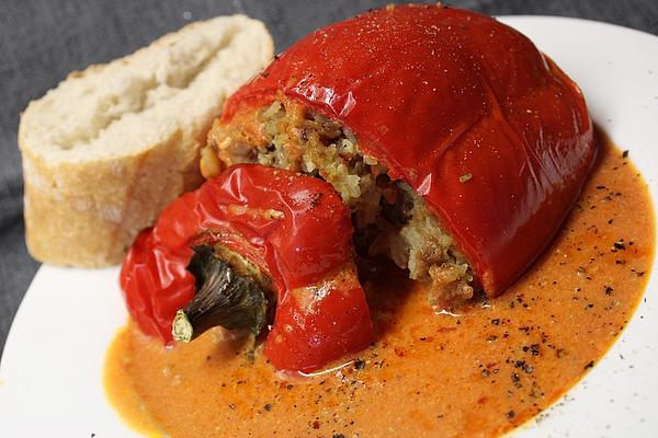 Stuffed Peppers with Minced Meat and Rice in Tomato-cream Sauce