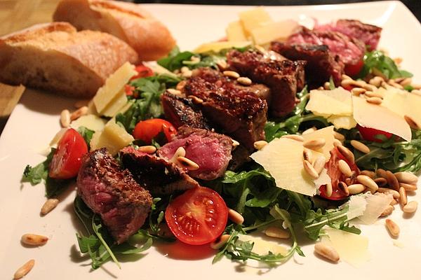 Tagliata Di Manzo on Rocket with Pine Nuts and Parmesan