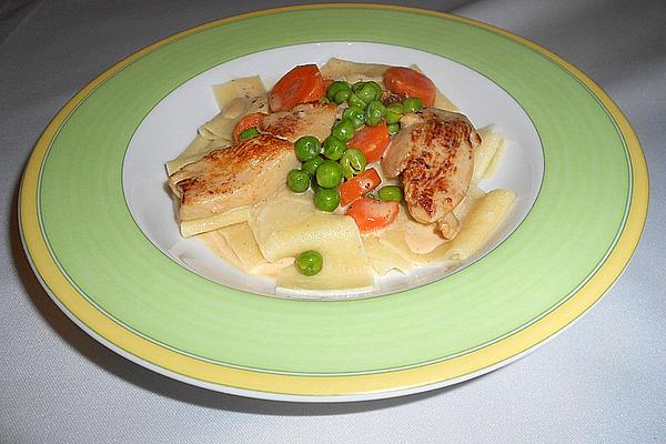 Tagliatelle with Turkey Strips and Vegetables in White Wine Cheese Sauce