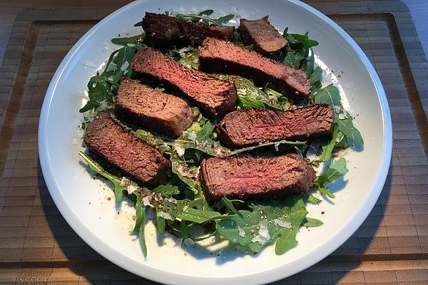 Thin Slices Of Beef Fillet on Rocket