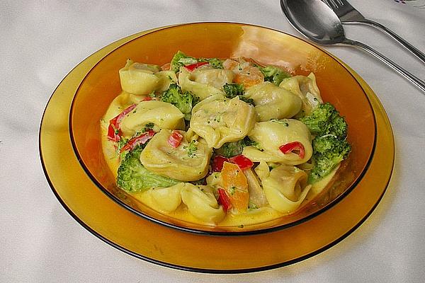 Tortelloni with Carrots and Broccoli in Cream Cheese Sauce