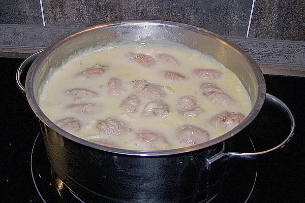 Turbot Cream Soup with Salmon Dumplings