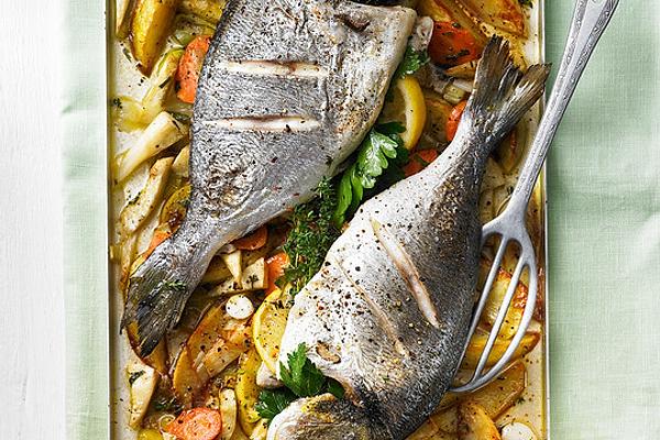 Whole Fish on Potatoes and Vegetables