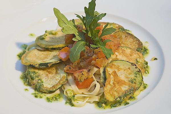 Zucchini – Piccata on Tomato Compote with Rocket Pesto and Noodles