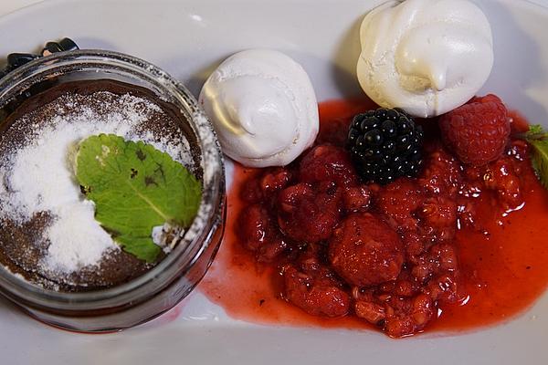 Chocolate Cakes with Meringue and Raspberries