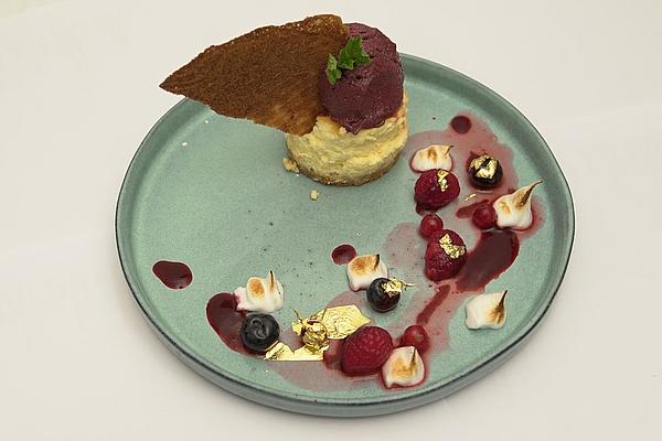 Flamed New York Cheesecake with Wildberry and Avocado Ice Cream