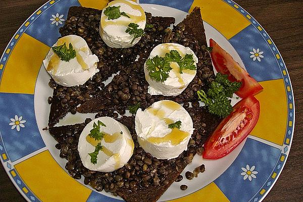 Goat Cheese with Honey and Lentils on Black Bread