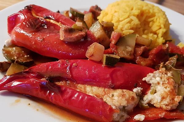 Pointed Peppers Stuffed with Cheese on Bed Of Vegetables