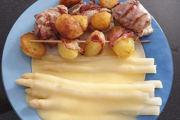 Pork Tenderloin and Grilled Potatoes Wrapped in Bacon with Hollandaise Sauce