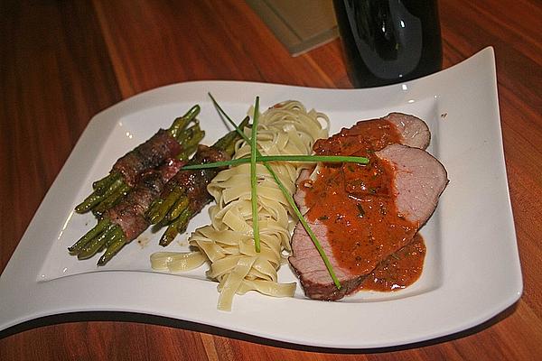 Saddle Of Veal with Tagliatelle and Green Beans Wrapped in Smoked Bacon