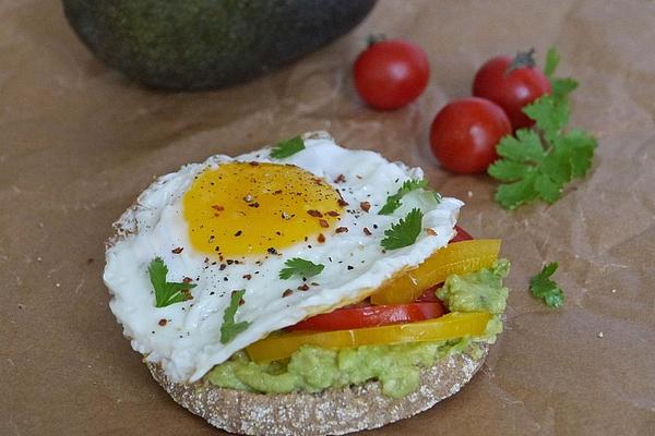 Toast Rolls with Avocado Cream, Bell Pepper, Tomato and Fried Egg