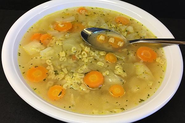White Cabbage and Carrot Soup with Letter Noodles